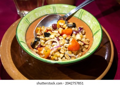 Ancient Roman Food Antipasti Pearl Barley Salad With Tomatoes, Olives, Red Onion Close Up