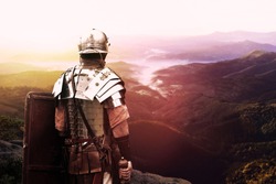 Ancient Roman Soldier Is Watching The Valley At Sunset