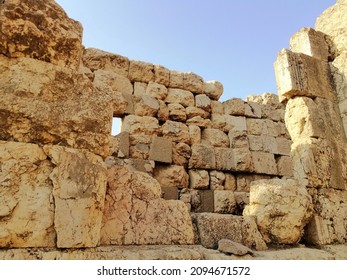 Ancient Roman temple of Bacchus, Ruins, with surrounding ruins with blue sky in the background, Heliopolis, the City of the Sun, Bekaa Valley, 
