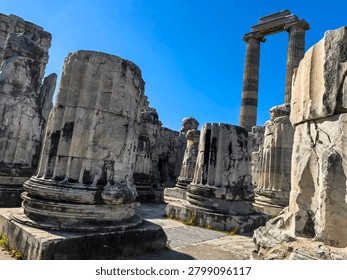 Ancient ruins and massive ionic columns of the Hellenistic Temple of Apollo at the sanctuary of Didyma in Turkey.