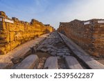 Ancient ruins of Pompei city, Naples, Italy. View of ancient street of Pompeii, Pompei is ancient Roman city destroyed from eruption of Mount Vesuvius in 1st century, Naples, Italy