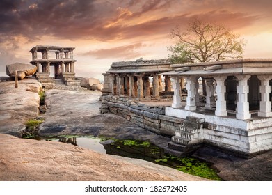 Ancient Ruins Of Vijayanagara Empire At Sunset Sky In Hampi, Karnataka, India