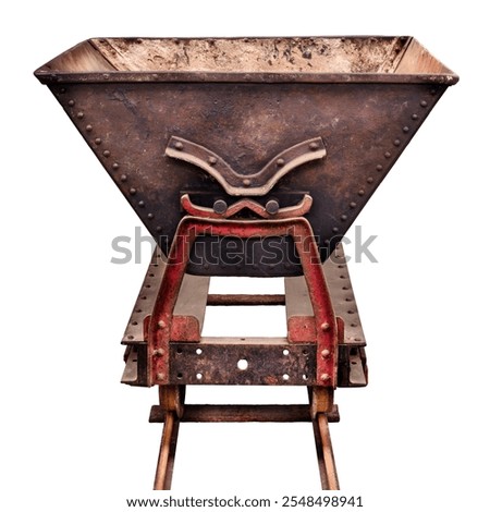 Ancient rusted and weathered mine wagon on a railroad track isolated on a white background