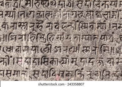 Ancient Sanskrit Text Etched Into A Stone Tablet.