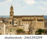 The ancient Santa Maria Assunta cathedral in the downtown of the picturesque Italian town of Gravina in Puglia, Bari, Italy.