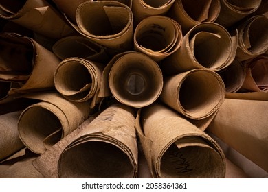 Ancient Scribe Library. Scrolls With Futhpak Symbols Stacked On Pile. View From Inside.