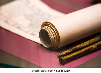 An Ancient Scroll On The Table Close-up