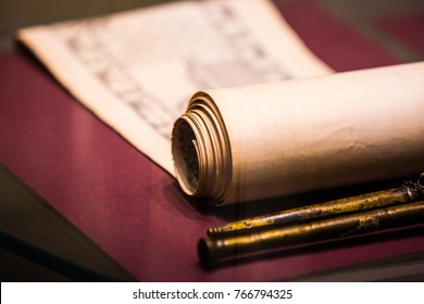 An Ancient Scroll On The Table Close-up