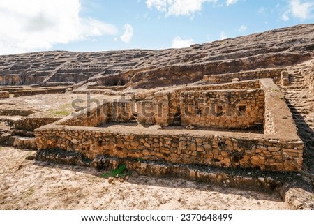 Ancient settlement remains of the buildings at the foot of the rock. Archaeological site of the ancient Inca fortress of Samaipata, Santa Cruz Department, Bolivia.