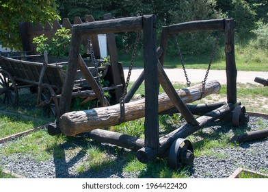 An Ancient Siege Weapon. A Large Log On Chains.