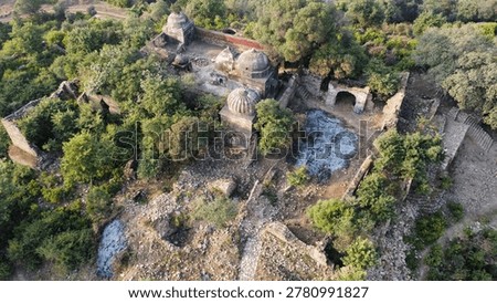 Ancient Sikh temple compound surrounded by forest in Tilla Jogian pakistan