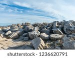 The ancient site of Magnesia on the Meander, located 19 km of Ephesus and 24 km of Miletus, lies on a major road which cuts through the site. Magnesia is situated on the banks of the Lethacus River.