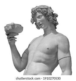 Ancient statue of Dionysus isolated on a white background. Dionysus is the God of the grape harvest, wine and merriment. Also known as Bacchus - Shutterstock ID 1910270530