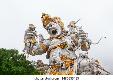 Ancient statue of fighting Kumbhakarna Rakshasa from epic Hindu legend Ramayana in Bedugul botanical garden. Traditional arts, culture of Bali, popular travel destination in Indonesia