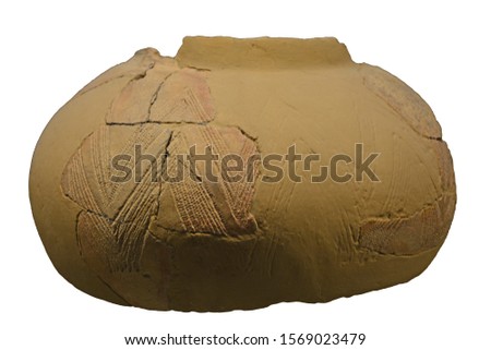 An Ancient Stone Age bowl from 8,000 years ago, found in Sicily, decorated with a geometric impressed design. Isolated against a white background