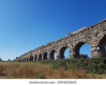 Ancient stone aqueduct near Rome - Powered by Shutterstock