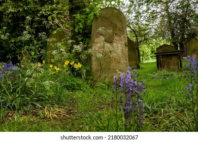 Ancient stone headstones at All Saints Cemetery in Jesmond, Newcastle
