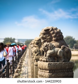 Ancient Stone Lion On The Marco Polo Bridge In Beijing,China