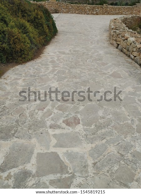 ancient\
stone road meju stone walls over the\
dividing
