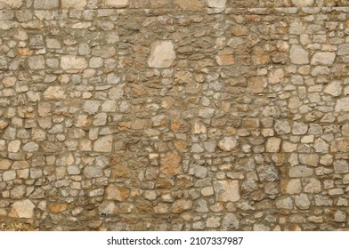 Ancient Stone Wall In Light Brown Color.