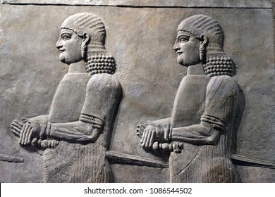 Ancient Sumerian Stone Carving On Wall, Bas Relief On Wall.