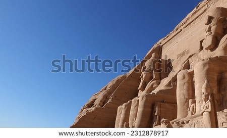 An ancient temple complex, cut into a solid rock cliff, Abu Simbel, Egypt.