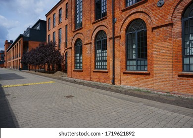 Ancient textile factory - details of architecture of the city of Lodz, Poland. Loft Aparts. - revitalized - Powered by Shutterstock