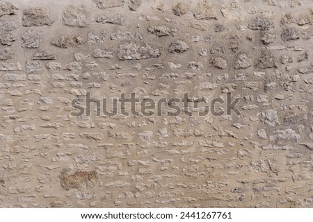 Ancient Textured Stonework of a Time-worn Fortress Wall