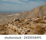 Ancient Thira (Thera) is an ancient city located on the steep rocky cape Mesa Vouno on Santorini island, Greece. The ruins of ancient buildings.