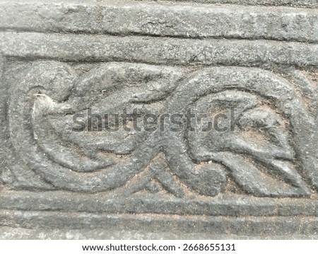 ancient tombstone carvings are one example of a tomb that is often found in cemetery areas.