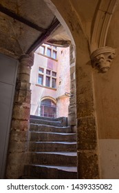 Ancient traditional "traboule" (old urban passage) with stairs in Lyon, France