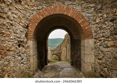 ancient Trencin Castle in Slovakia 11th century. A wall with an archway. - Powered by Shutterstock