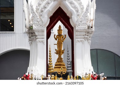Ancient trimurti god statue or lord supreme trinity figure in shrine for thai people traveler travel visit and respect praying blessing holy on patio of central world at Pathumwan in Bangkok, Thailand