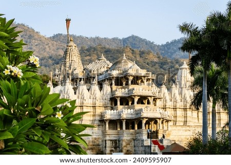ancient unique temple architecture with bright blue sky at day from different angle image is taken at ranakpur jain temple rajasthan india.