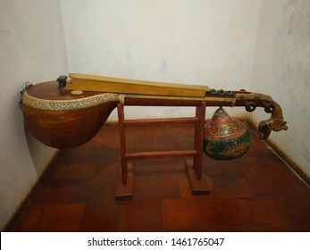 Ancient Veena Displayed In A Stand