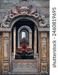 Ancient votive shrine of Pandra Shivalaya with Shiva Lingam in Pashupatinath Temple in Kathmandu, Nepal, religious symbol in Hinduism emanates sacred aura and divine energy