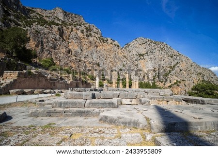 Ancient walking path of Delphi. Archaeological site in Greece. Greek religious sanctuaries to the god Apollo. UNESCO World Heritage. View of ancient Delphi theater.