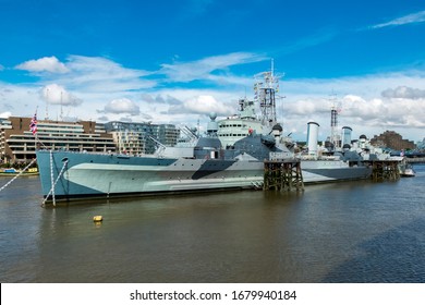 Ancient War Ship HMS Belfast, Now A Museum, Moored In River Thames In London