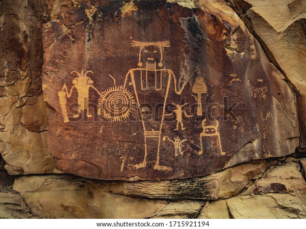 Ancient Warrior and anthropomorphic petroglyphs\
made by the Fremont people at McKee Springs inside Dinosaur\
National Monument, near the town of Jensen and the Utah-Colorado\
border, United States.