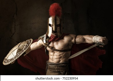 Ancient warrior or Gladiator posing over a dark background