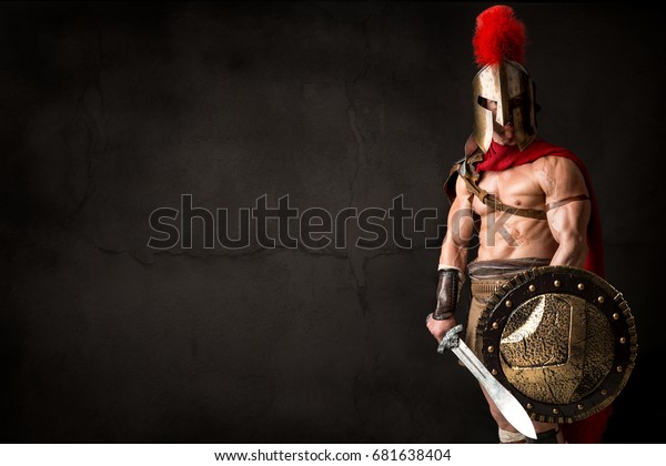 Ancient warrior or Gladiator posing over a\
dark background