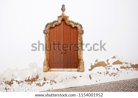 ancient window with space on wall for text