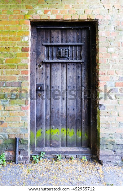 Ancient Wooden Door Brick Wall Iron Stock Photo Edit Now