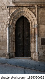An ancient wooden door in the city of Toledo, Spain
