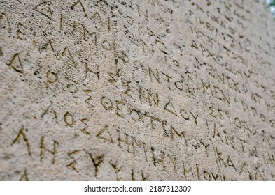 Ancient Writing On A Stone Slab