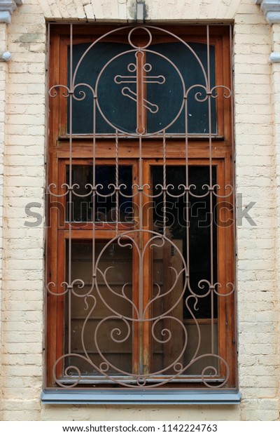 Ancient Wroughtiron Grille Decorative Security Element Stock Photo