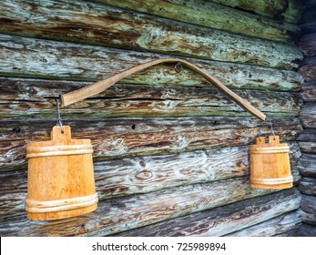 Ancient yoke with buckets. - Shutterstock ID 725989894