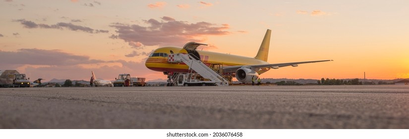 Ancona, Italy - August 26 2021: A Boeing 757 cargo aircraft resting on the airport apron.