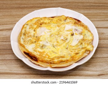 Anda Cheese Paratha Places In A Plate