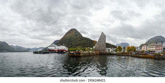 Andalsnes, Norway: September 2nd 2020 - Panorama of Andalsnes with Norsk Tindesenter, Hurtigruten Cruise ship and Romsdaseggen Hike Trail